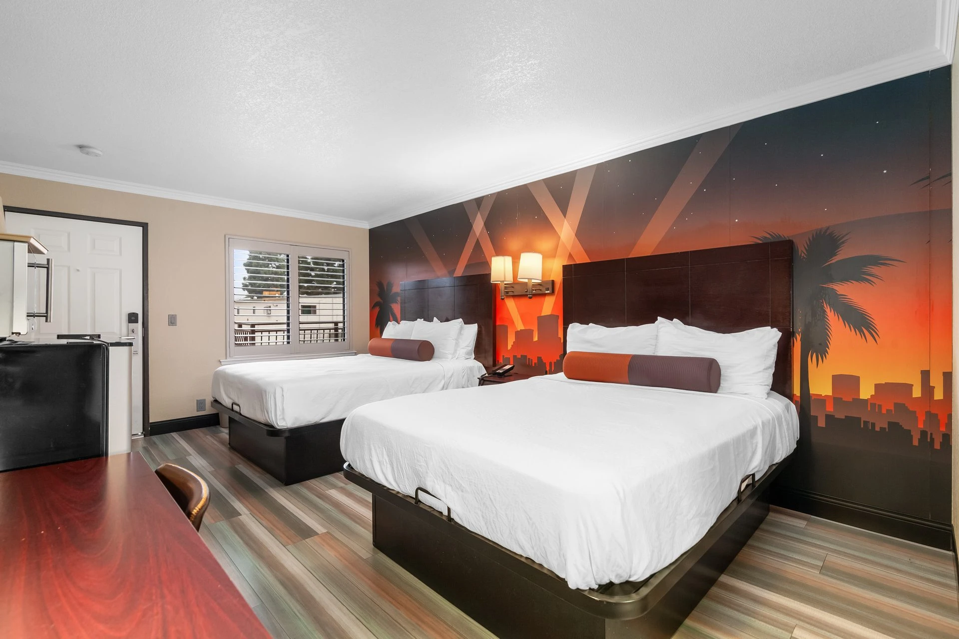 Two Queen Beds with comfortable linens and headboards